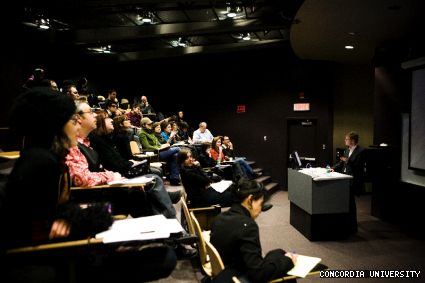 Charles Acland addresses the crowd at Screen World on Feb. 12, a symposium which brought together students and faculty from communications, film studies, history, English, journalism, sociology and other disciplines.